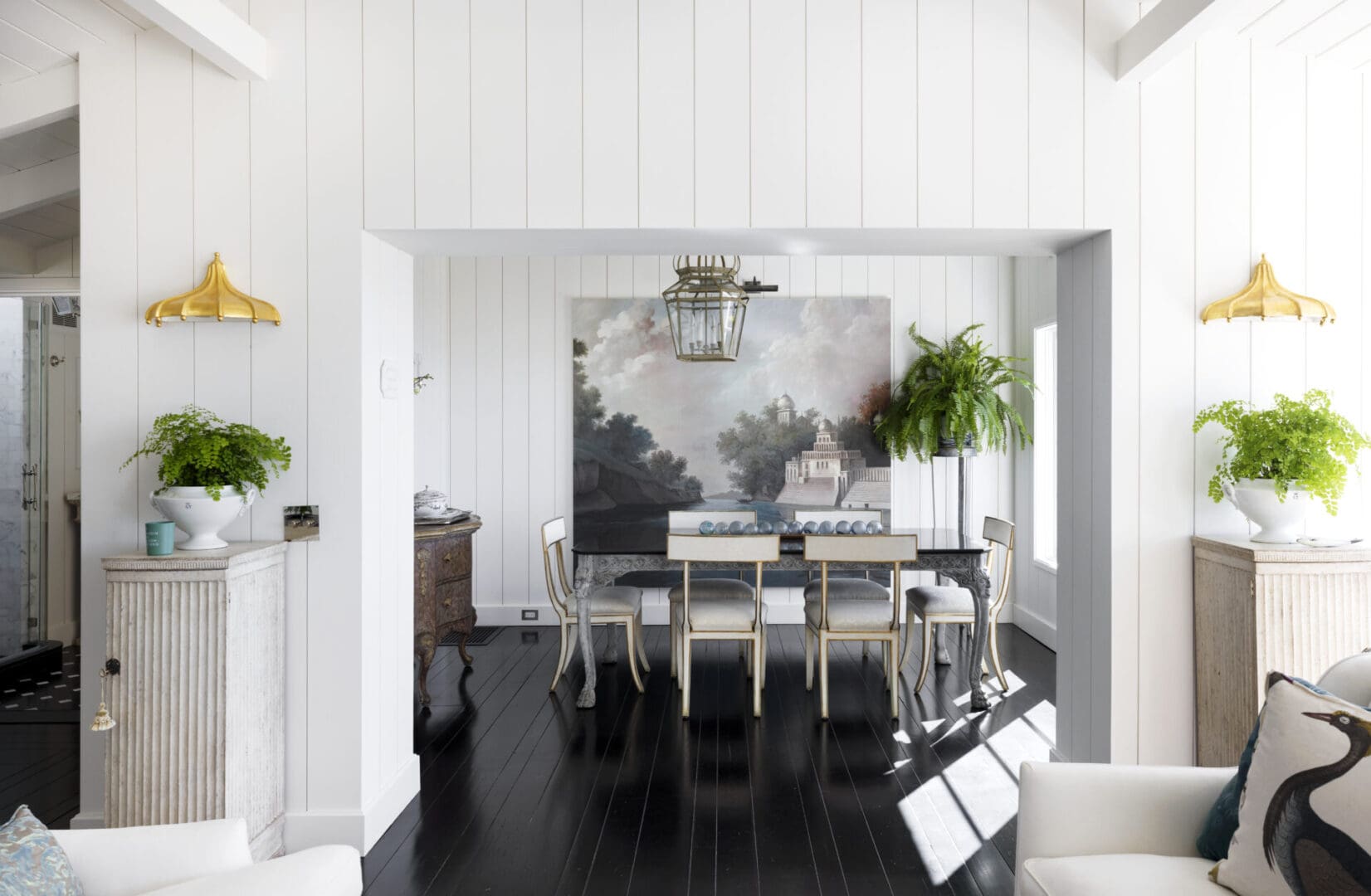 Long view of the dining area with hanging light on top