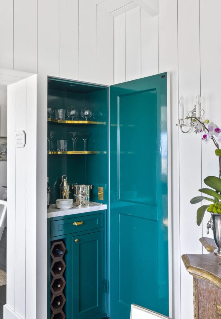 Open view of the cupboard with crockeries inside