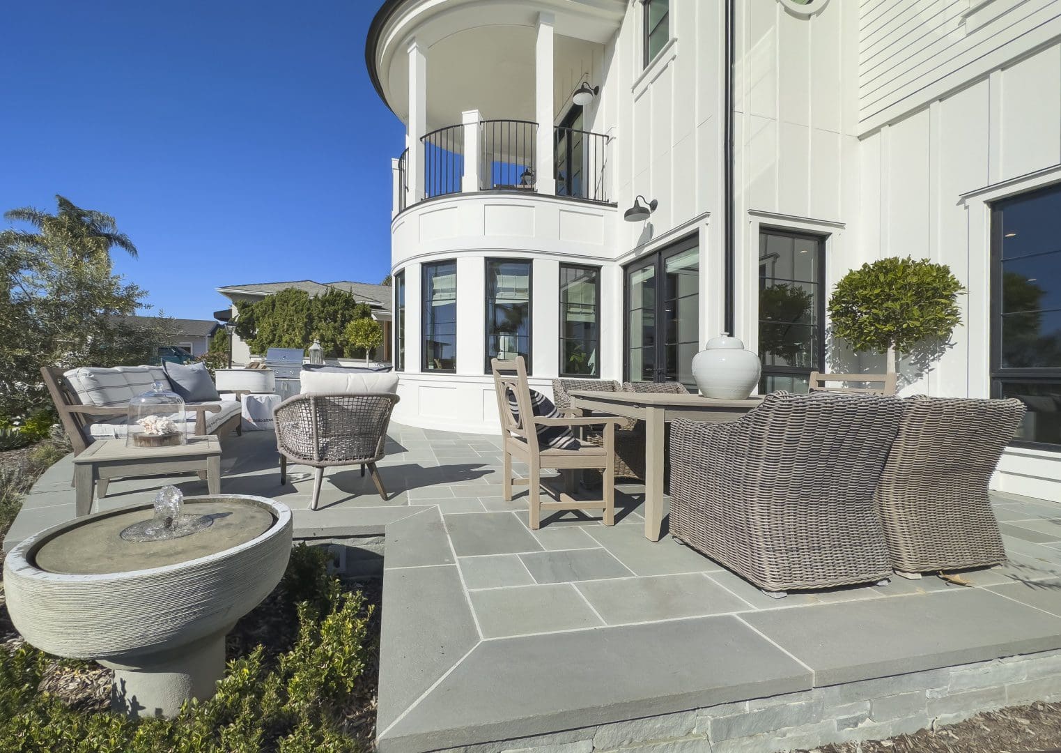 Sofas and tables arranged in the front yard