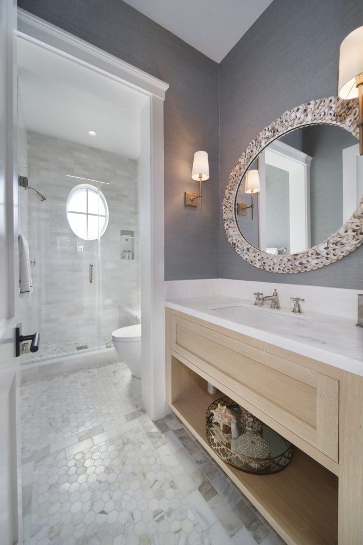 Close view of the round mirror inside the bathroom