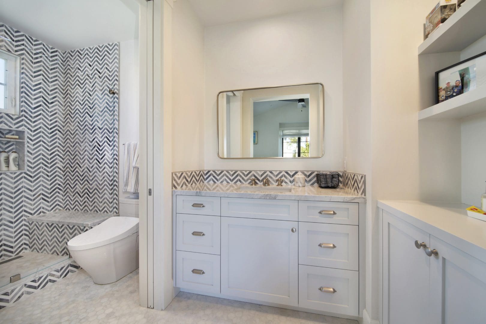 Close view of the rectangle mirror inside the bathroom