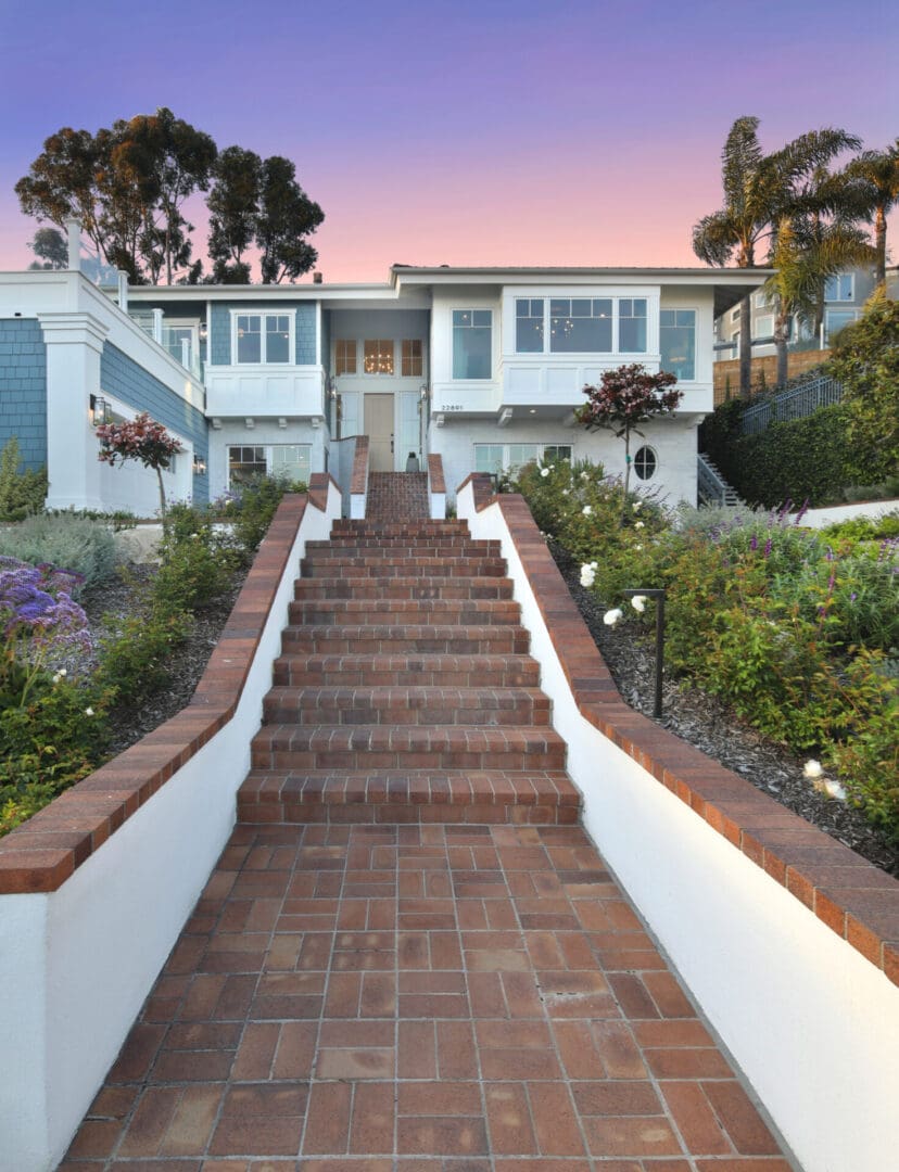 A home with steps leading up to it.