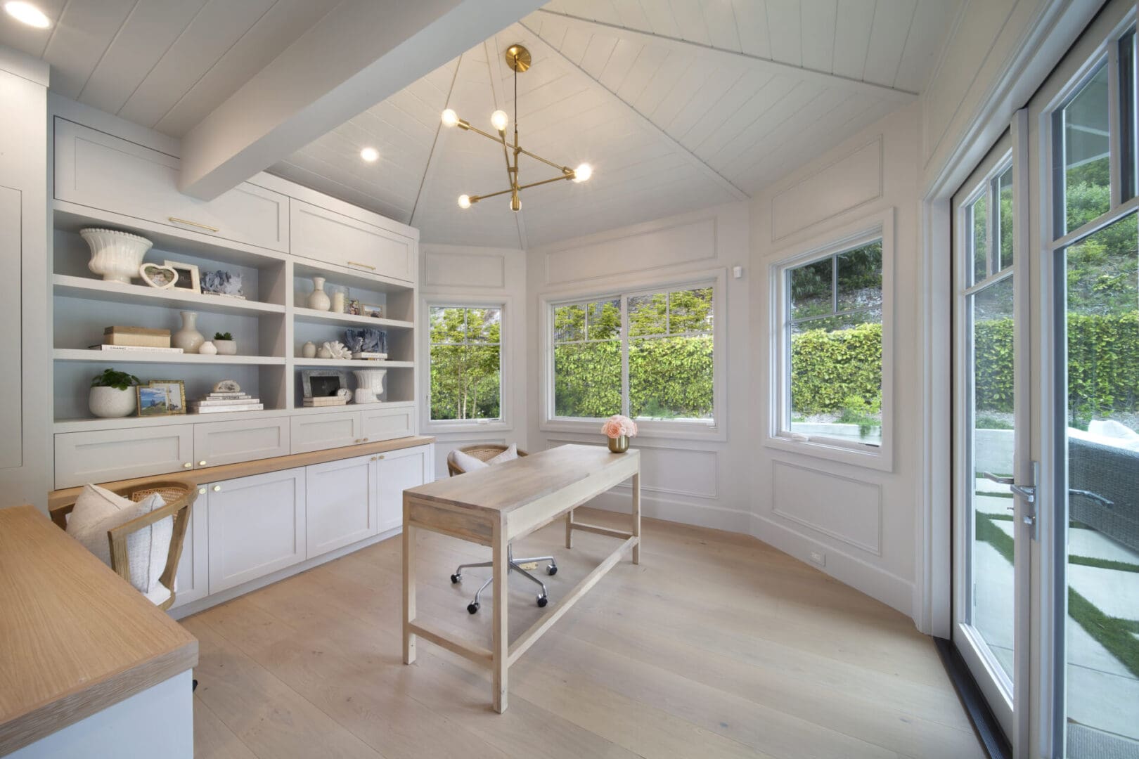 White color cabinets with wooden tables