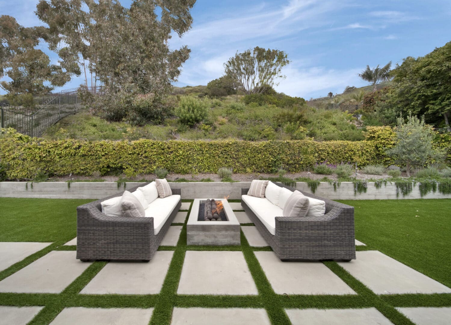 Gray color sofas placed on the backyard